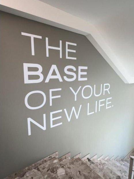 Scala con la scritta The base of your new life