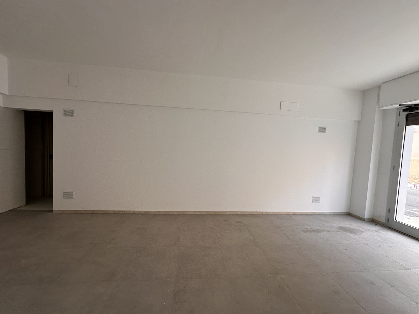 Il locale di Via Pesaro vuoto, prima dei lavori